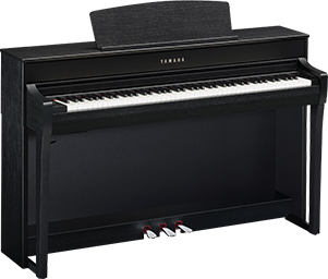 Digital upright piano in black with three pedals and open key cover.